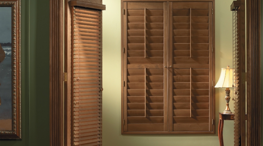 Don't be afraid to mix wood blinds with shutters.  ShutterLuxe can coordinate various types of treatments using the same woods, colors, or stains while offering you an extensive array of upgrades like the enhanced Divider Rail shown here.  